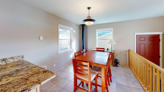 tiled dining area with plenty of natural light