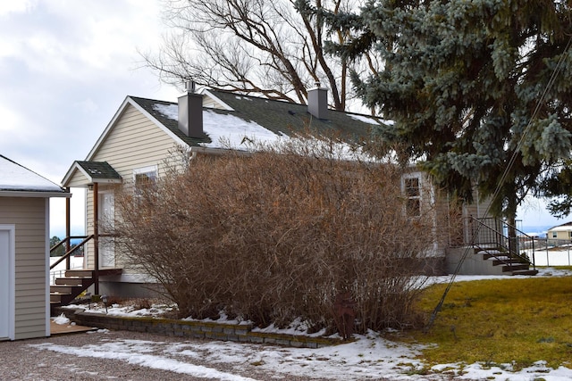 view of snow covered property