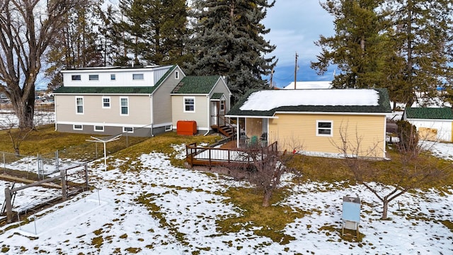 view of snow covered property