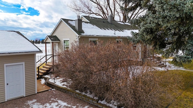 view of snow covered property