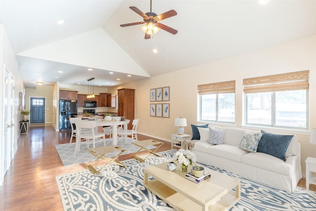 28 Talbot Pines Loop, Columbia Falls, MT 59912 - living area with ceiling fan, light wood finished floors, high vaulted ceiling, and recessed lighting