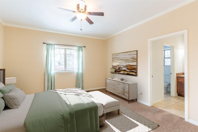 28 Talbot Pines Loop, Columbia Falls, MT 59912 - bedroom with crown molding, light carpet, connected bathroom, and a ceiling fan