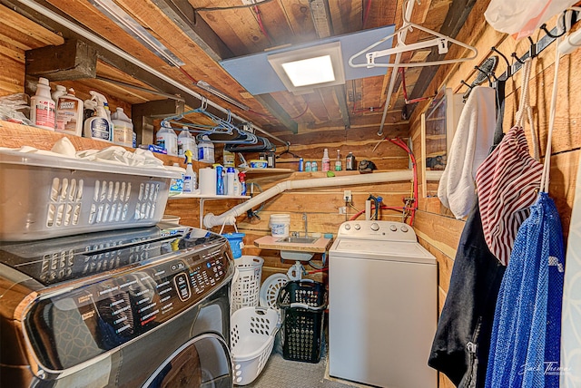 clothes washing area with laundry area, washer hookup, a sink, and carpet flooring