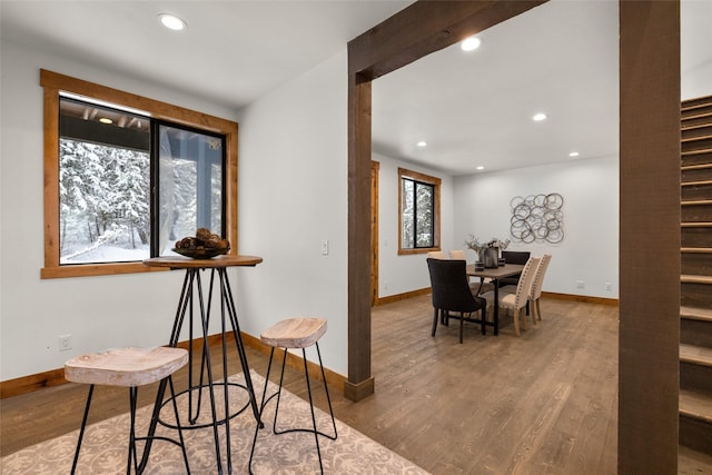 dining room with wood-type flooring