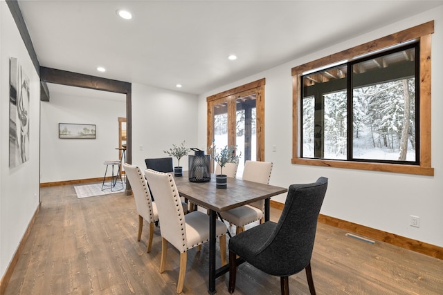 dining space featuring hardwood / wood-style floors