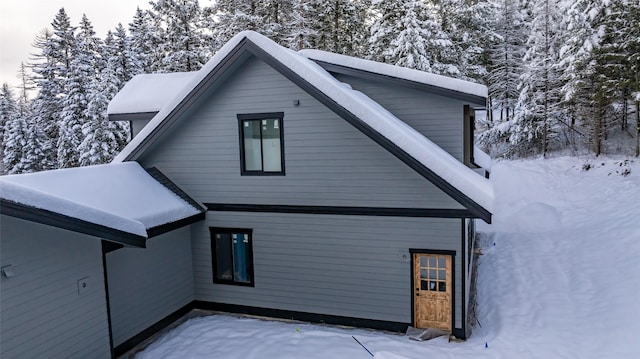 view of snow covered property