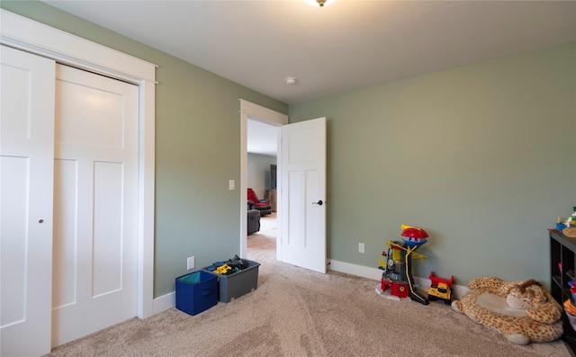 playroom with light colored carpet