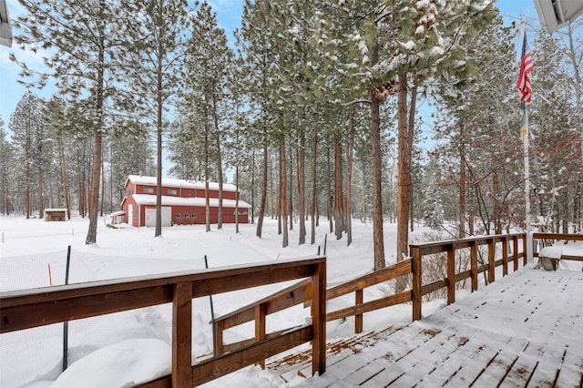 view of snow covered deck