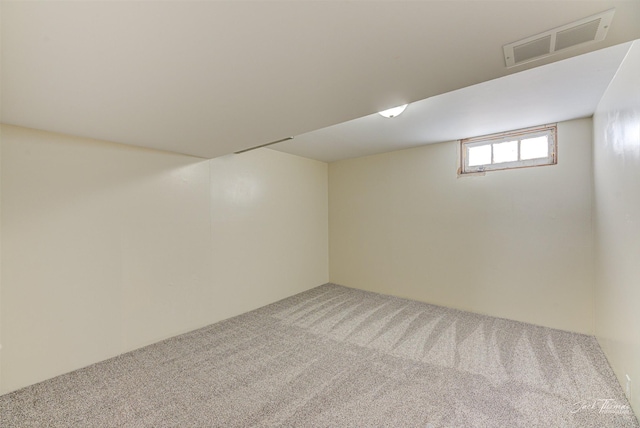 basement with carpet flooring