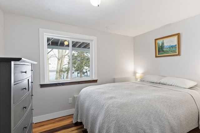 bedroom featuring hardwood / wood-style floors