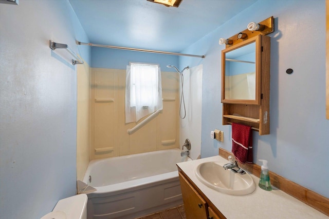 bathroom featuring vanity, tile patterned floors, and tub / shower combination