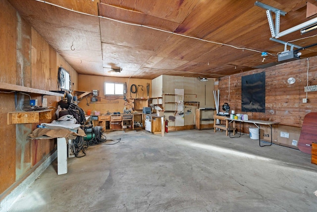 interior space with a workshop area and concrete floors