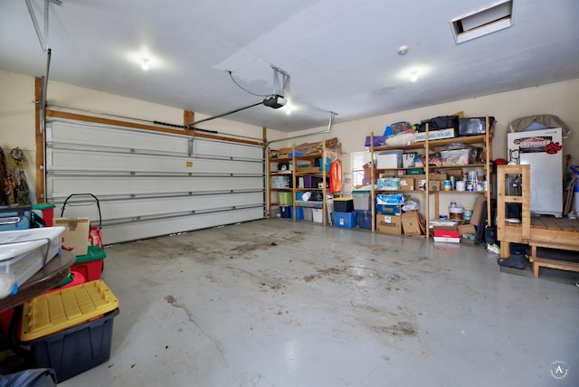 garage featuring a garage door opener