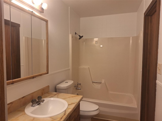 full bath with vanity, bathtub / shower combination, and toilet