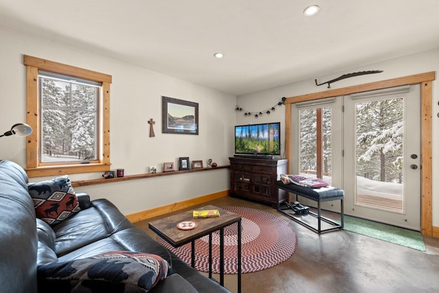 living room featuring concrete floors