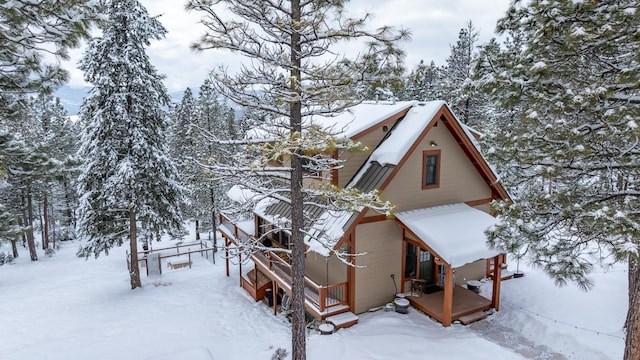 view of snow covered property