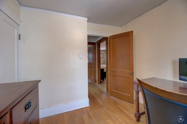 office featuring crown molding and light wood-type flooring