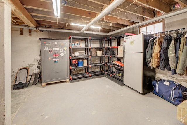 basement with fridge