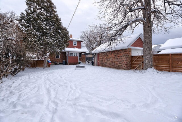 view of yard covered in snow