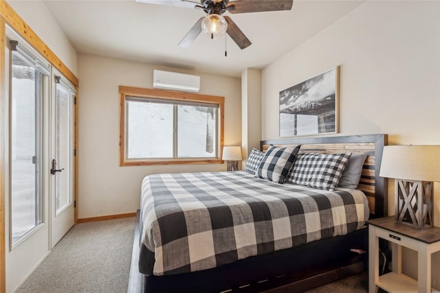 bedroom with ceiling fan, a wall mounted AC, light carpet, and access to outside