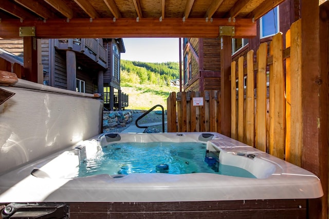 exterior space with a jacuzzi