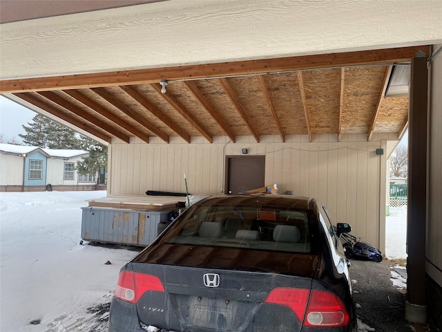 view of snow covered garage