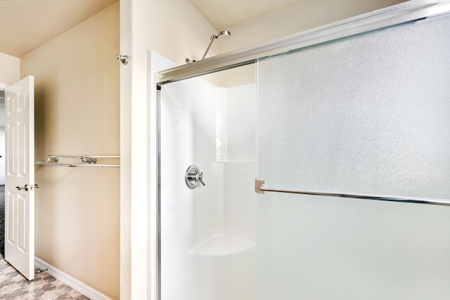 bathroom featuring a stall shower