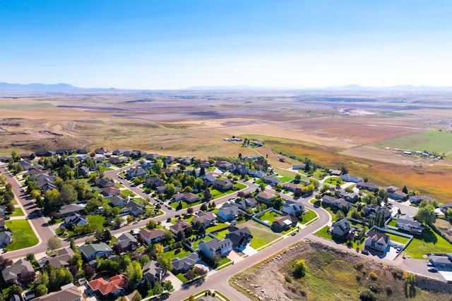 bird's eye view featuring a mountain view and a residential view