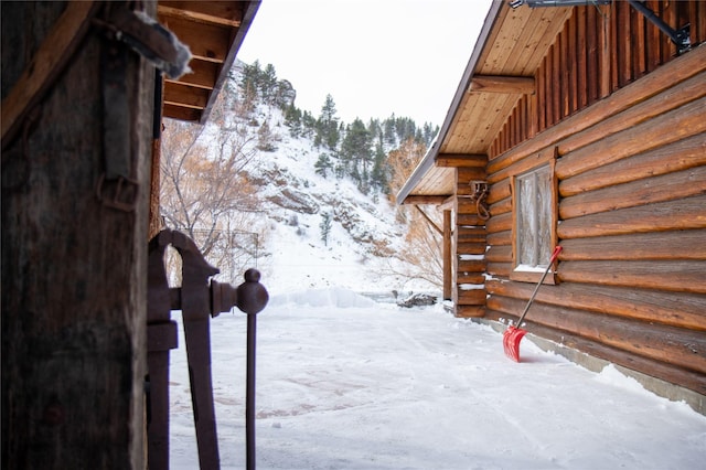 view of snow covered property