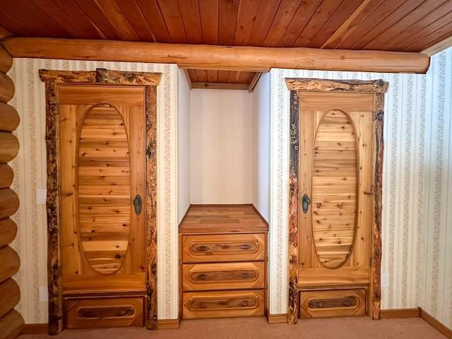 68 River Dr, Cascade, MT 59421 - detailed view of wood ceiling, carpet flooring, wallpapered walls, and baseboards