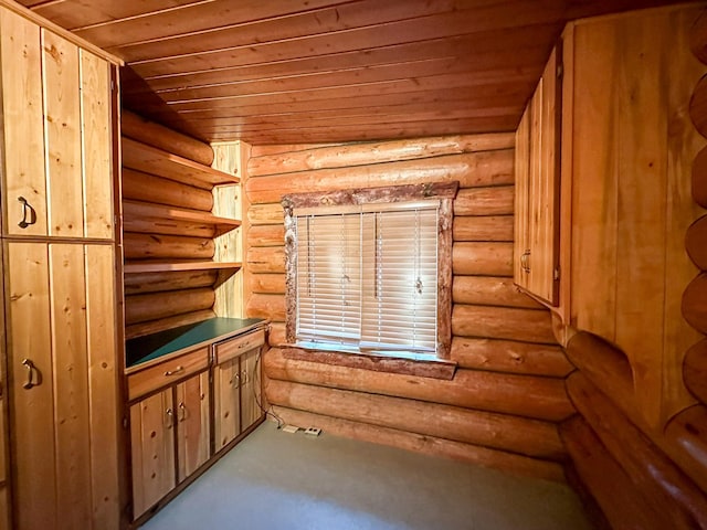 interior space featuring wooden ceiling