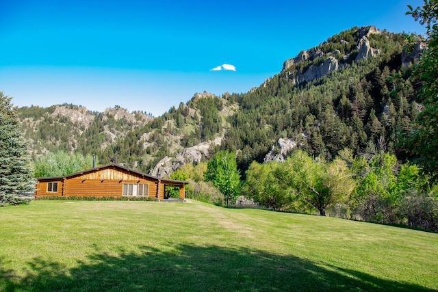 68 River Dr, Cascade, MT 59421 - view of grassy yard featuring a mountain view and a view of trees