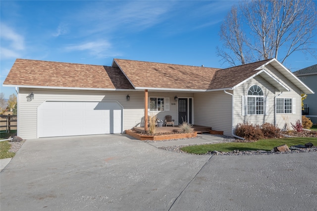 ranch-style house featuring a garage