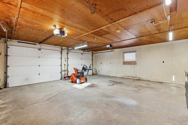 185 Veteran Dr, Columbia Falls, MT 59912 - garage featuring a garage door opener