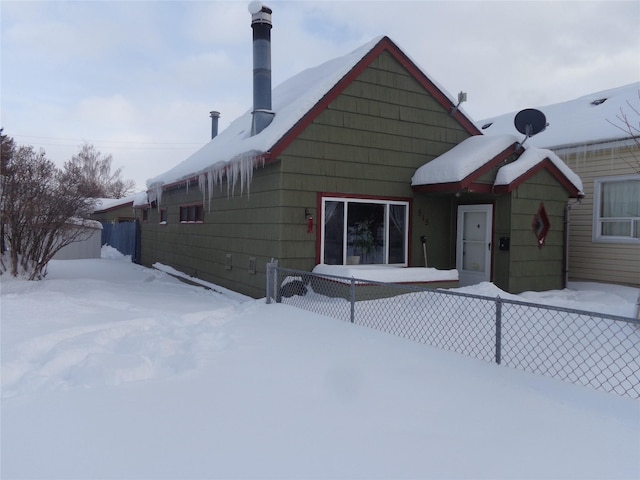 view of snow covered property