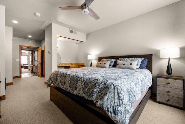 carpeted bedroom with ceiling fan