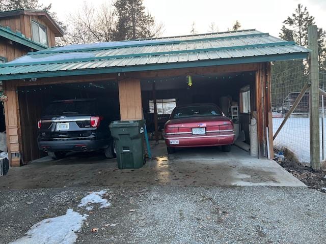 view of parking with a garage