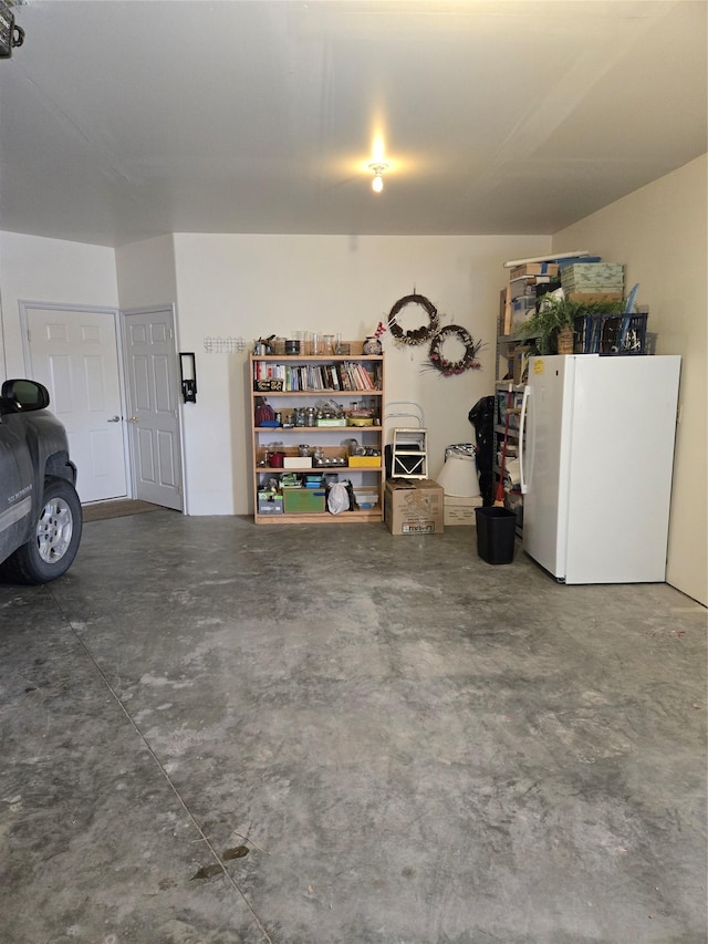 garage with white fridge