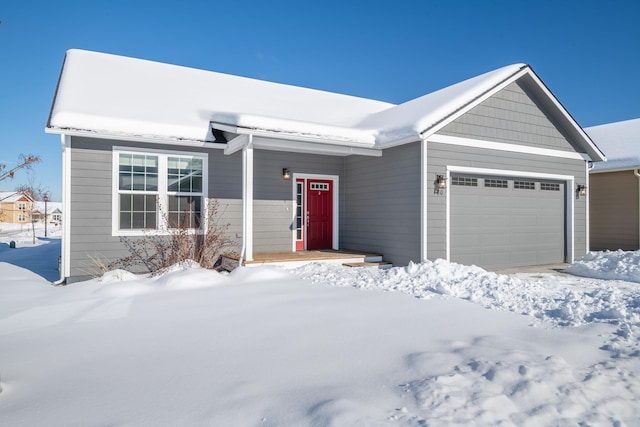 view of front of property featuring a garage