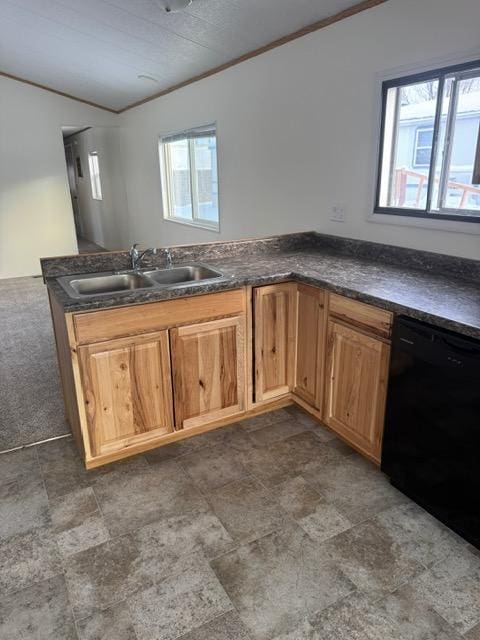 1730 N Hannaford St, Helena, MT 59601 - kitchen with vaulted ceiling, a sink, black dishwasher, and dark countertops