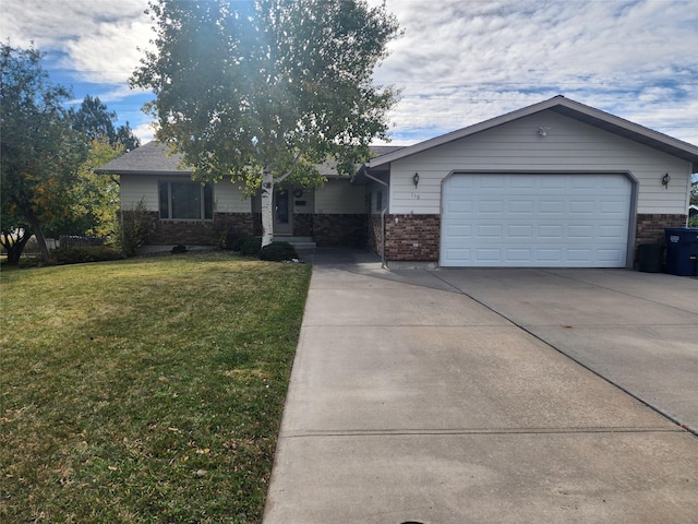 single story home featuring a garage and a front yard