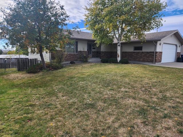 ranch-style house with a garage and a front yard