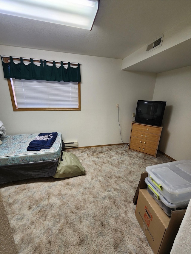 116 29th Ave NE, Great Falls, MT 59404 - carpeted bedroom with a baseboard radiator and baseboards
