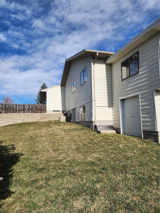 116 29th Ave NE, Great Falls, MT 59404 - view of side of home with a yard and a garage