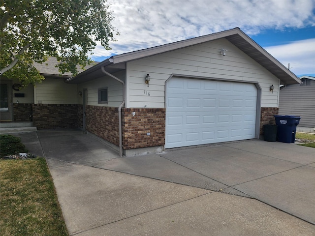 116 29th Ave NE, Great Falls, MT 59404 - garage featuring concrete driveway