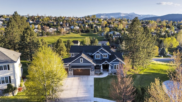 drone / aerial view featuring a mountain view