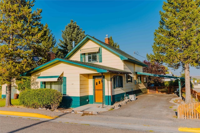 view of front of house featuring a carport