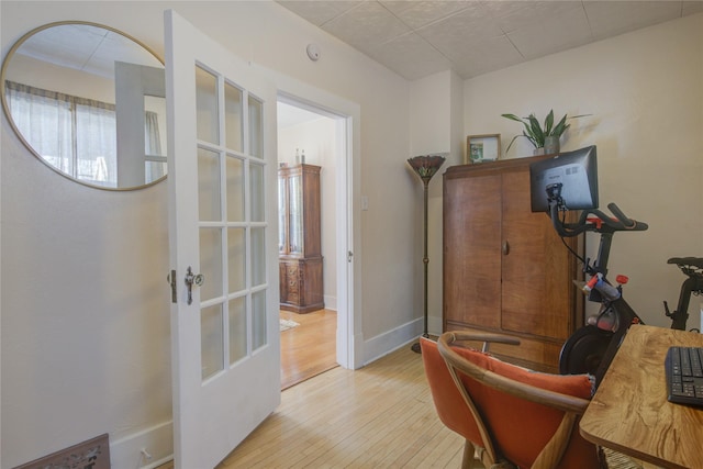 office with light wood finished floors and baseboards