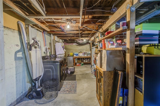 unfinished basement featuring separate washer and dryer