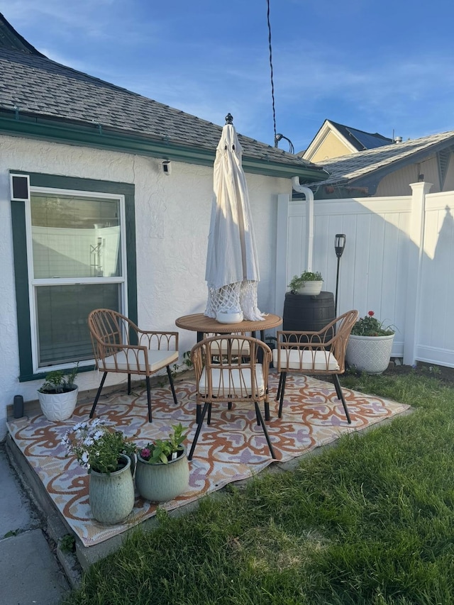 view of patio / terrace with fence